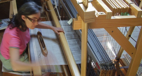 weaving at the loom