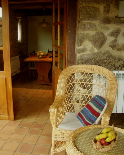 breakfast in Casa dos Artesans´ cool entrance hall with hand-made willow furniture