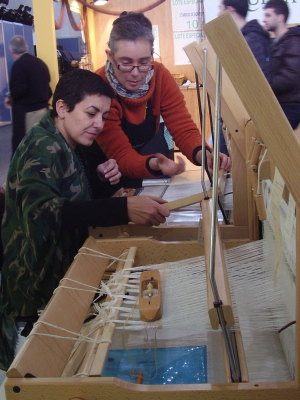 Craft Development Director Elena Fabeiro gets a close-up experience of weaving with Galician textile designer Anna Champeney