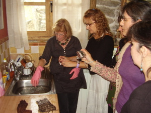 Lotte Dalgaard wet finishes the magical textiles with her group of Spanish weavers in th course run at Anna Champeney Estudio Textil in Galicia, Spain